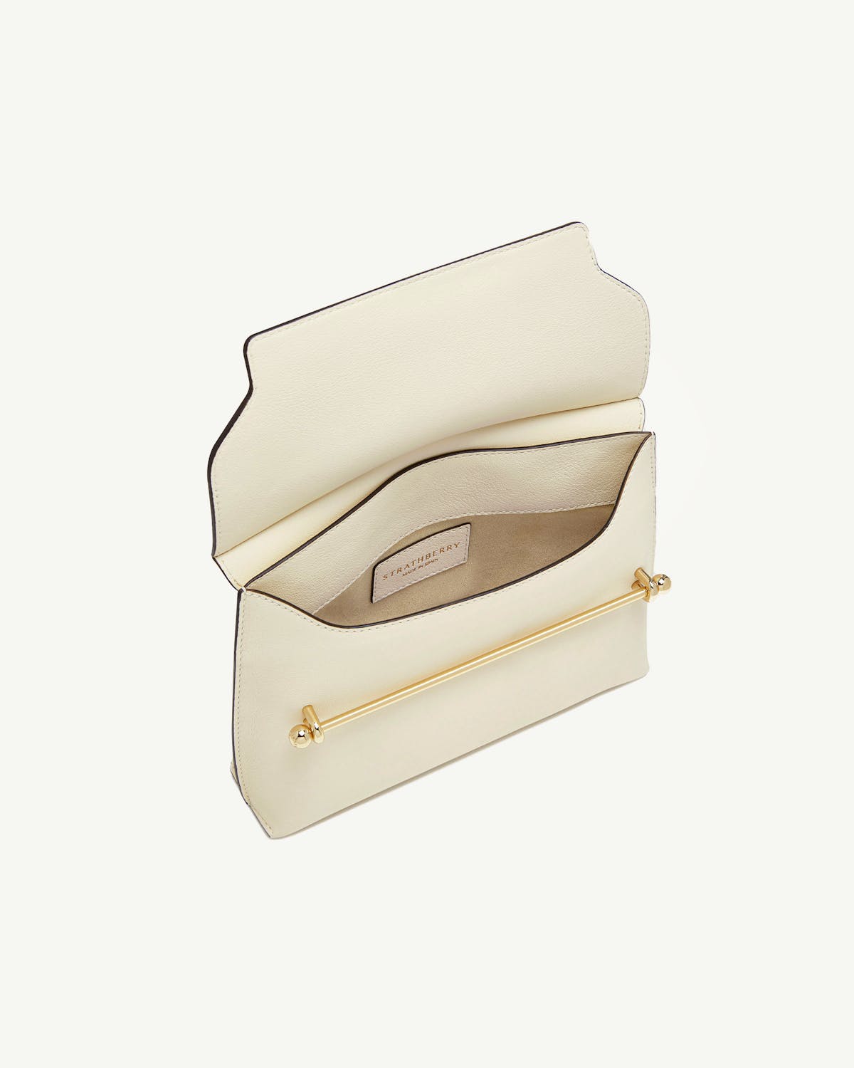 Strathberry Stylist bag in vanilla with open flap and gold bar