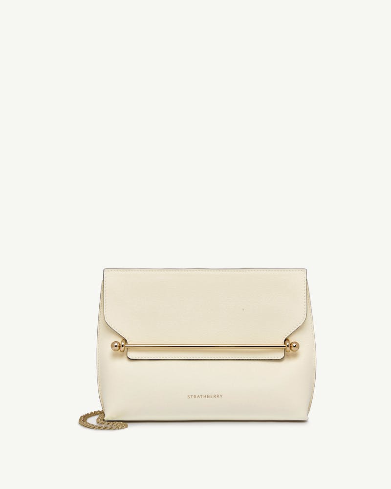 Strathberry Stylist bag in vanilla with gold bar and chain