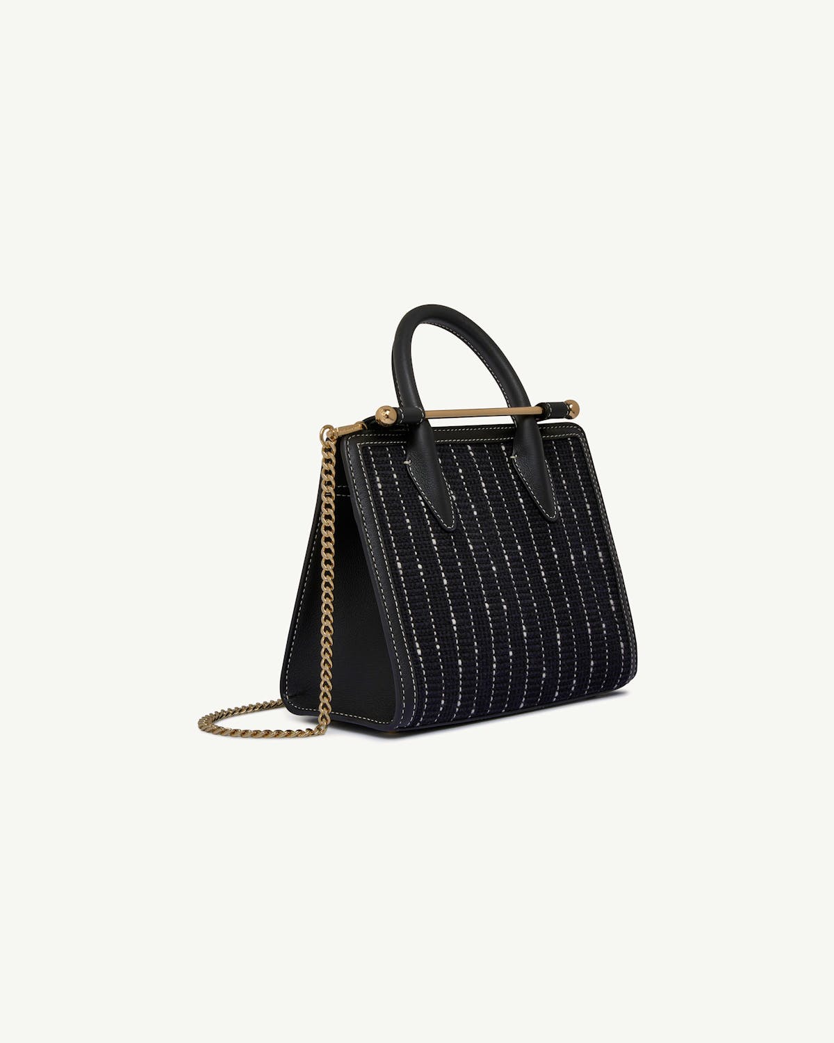 Black tweed mini tote with vertical stitching, gold chain and top handle