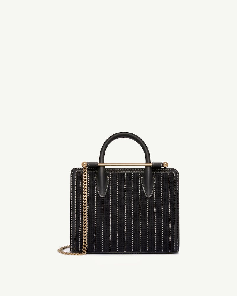 Black tweed mini tote with top handles and gold chain strap.