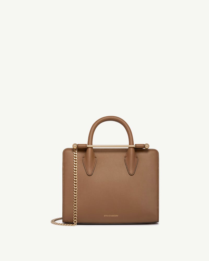 Strathberry mini tote in clay with gold chain and top handle