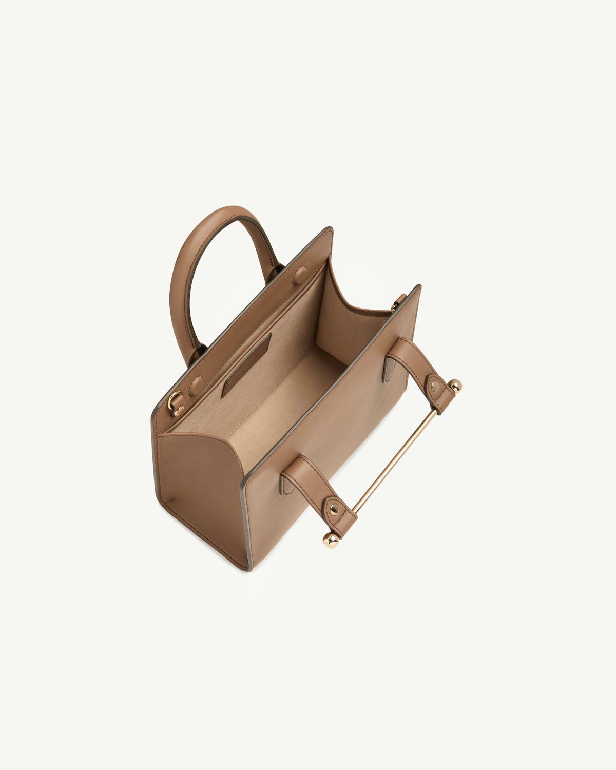 Clay mini tote with gold bar detail, top handle and open interior