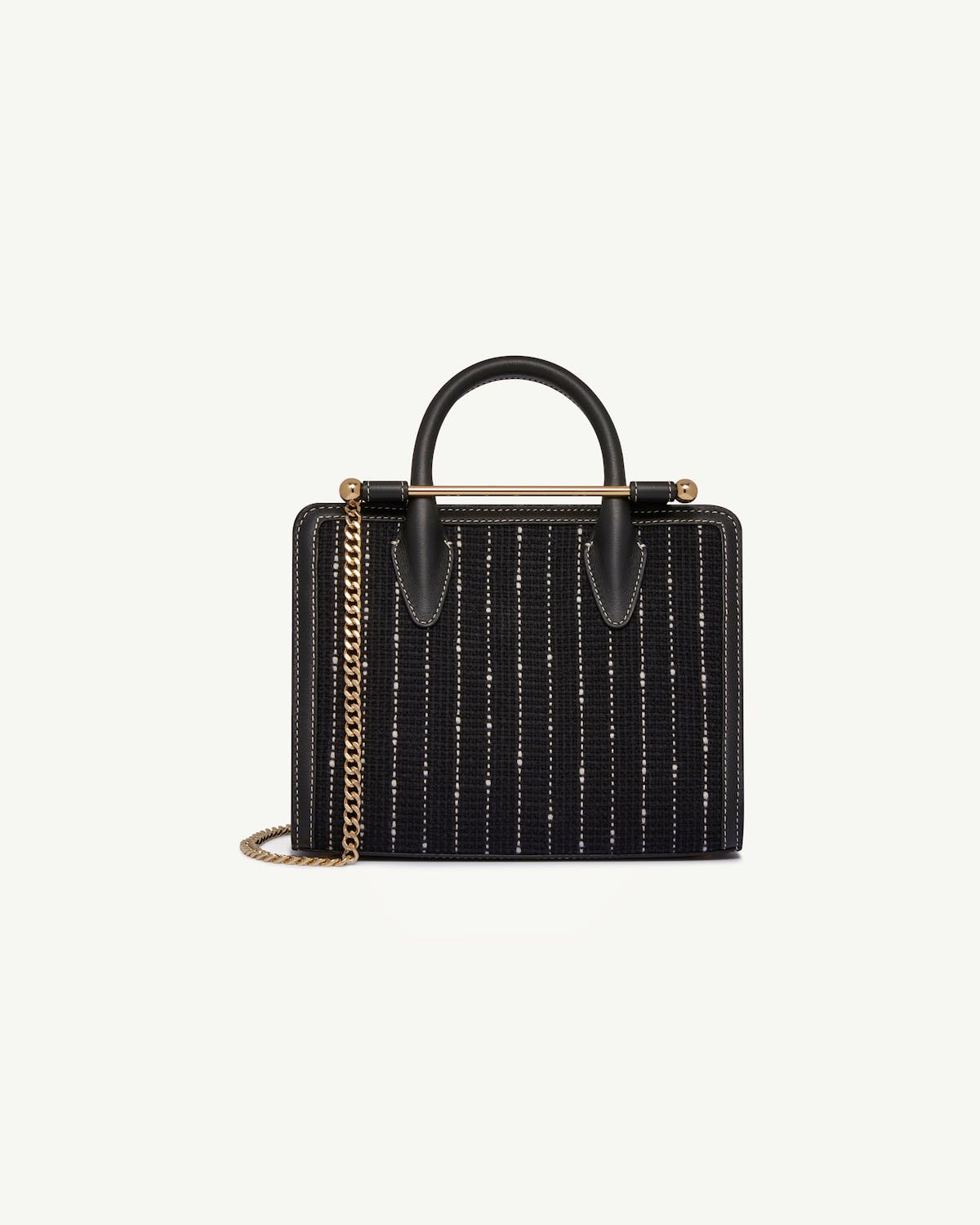 Black tweed mini tote with top handle and gold chain strap.