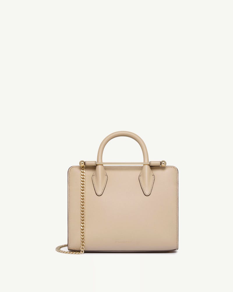 Strathberry mini tote in oat with top handles and gold chain strap