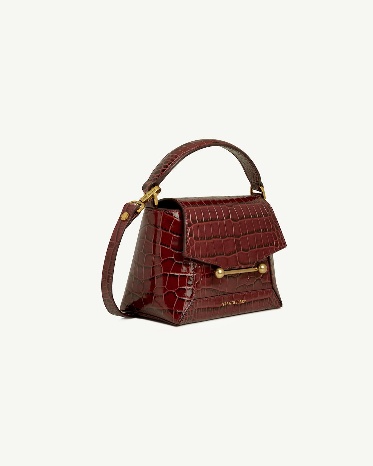 Strathberry Mosaic Nano croc-embossed burgundy top-handle bag angled view