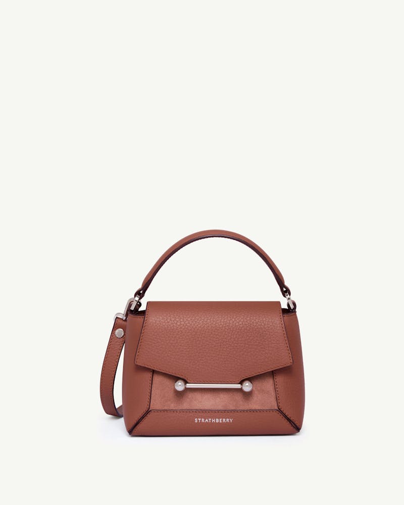 Strathberry Mosaic Nano bag in sienna and dusty pink suede with top handle.