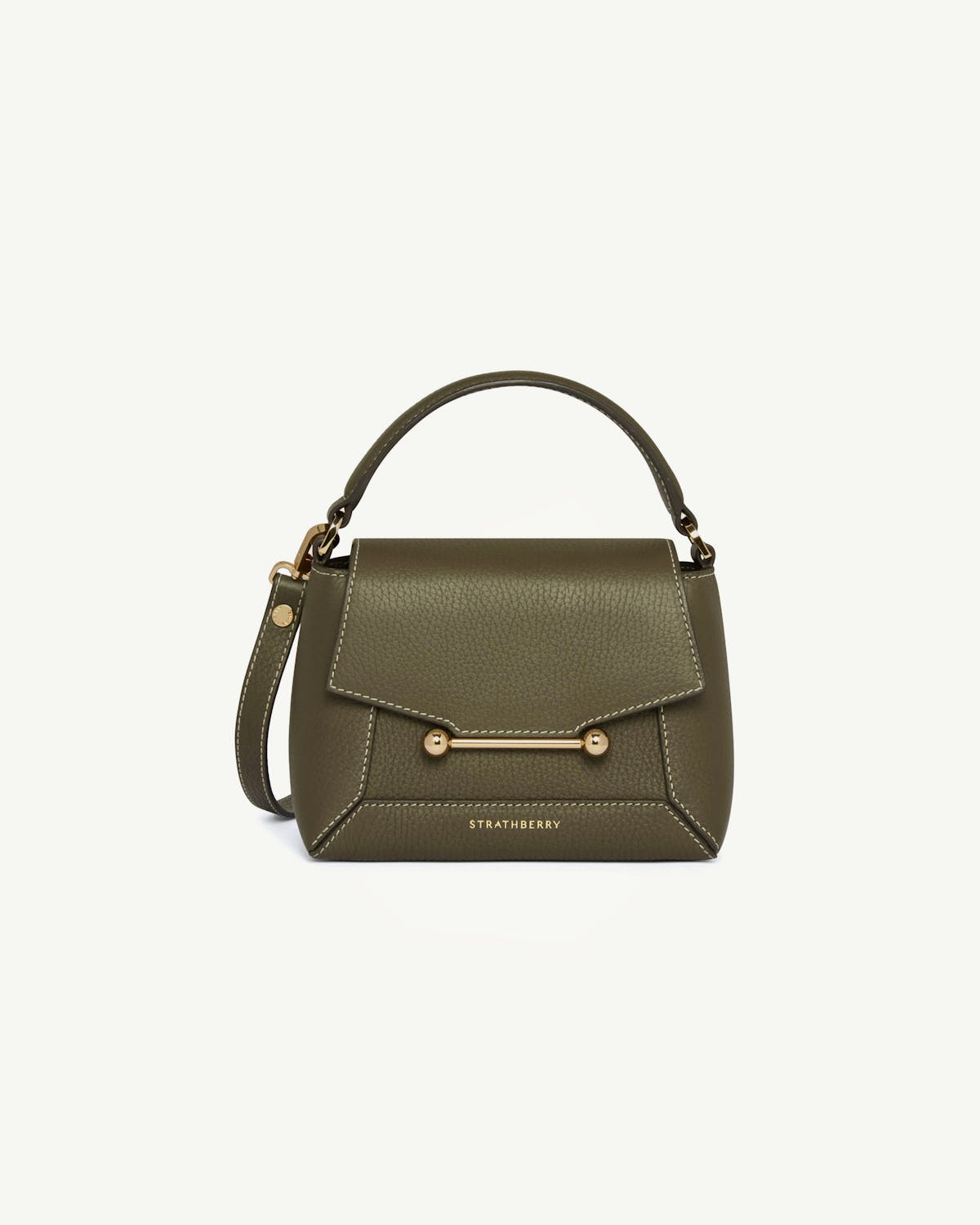 Khaki leather top-handle bag with gold bar fastening and Strathberry logo.