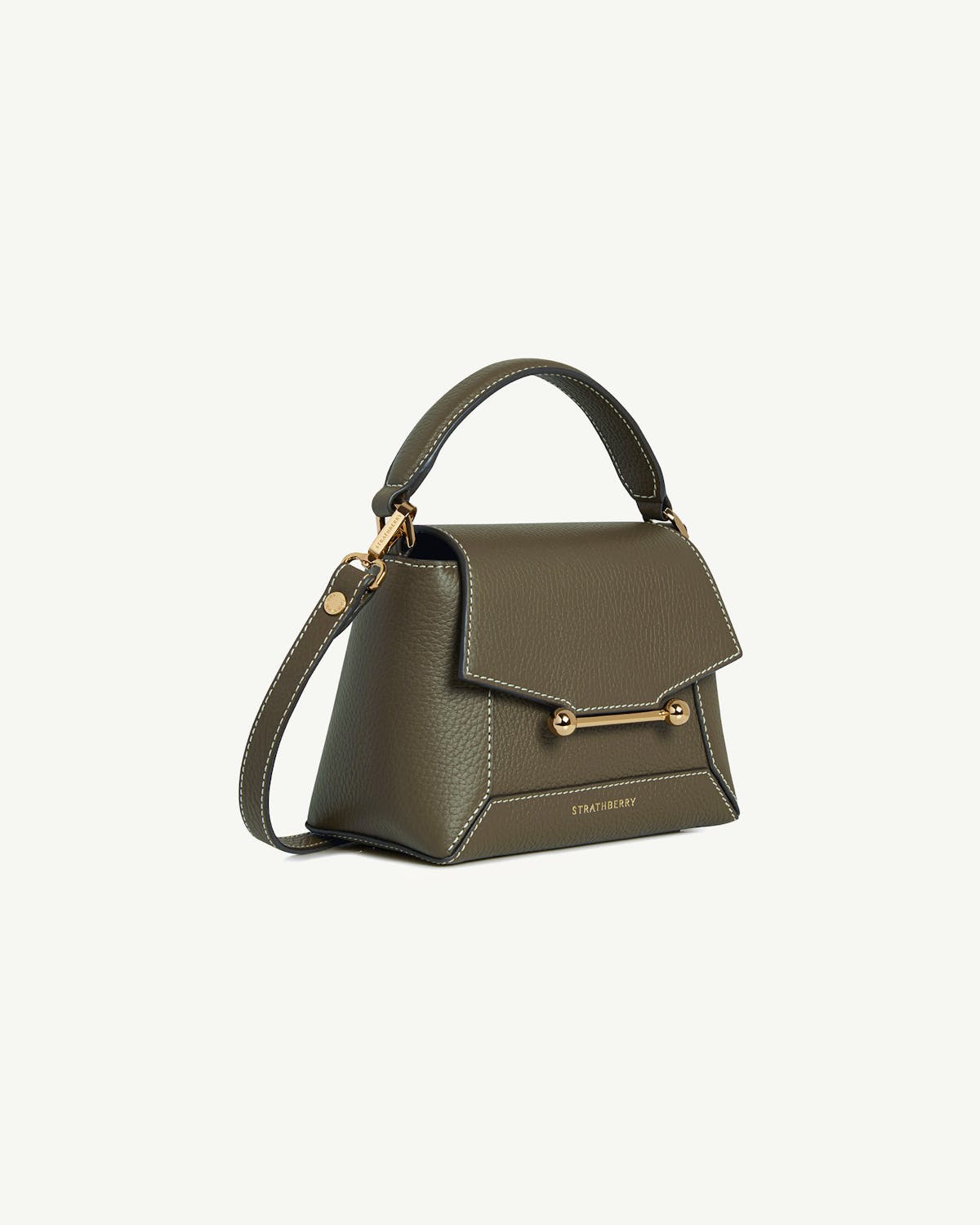 Khaki Mosaic Nano top-handle bag with strap, gold bar fastening and Strathberry logo.