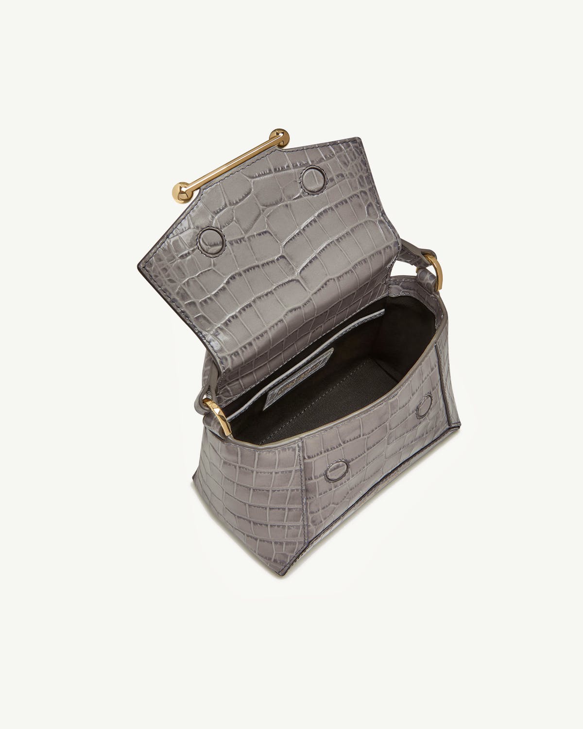Soft croc Mosaic Nano bag open showing interior and gold bar hardware.