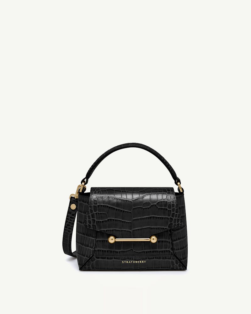 Strathberry Mosaic Nano bag in soft croc black with gold bar detail.