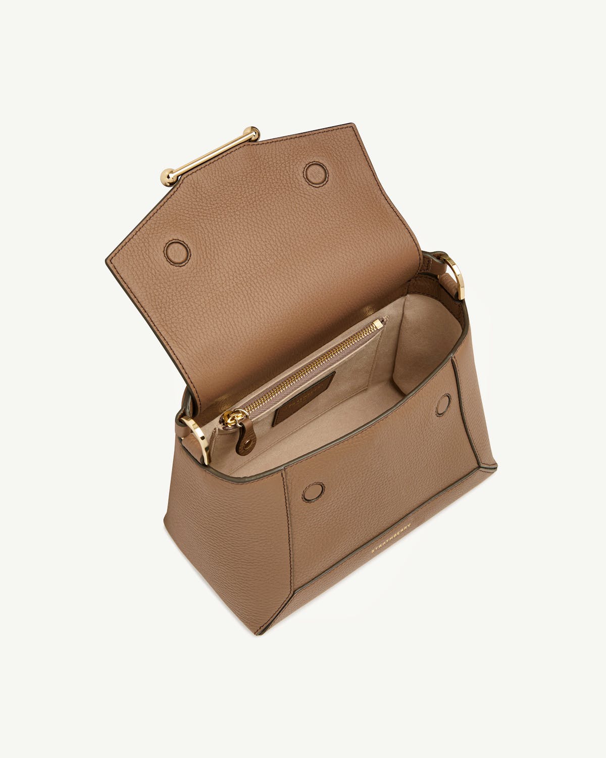 Strathberry mosaic bag in clay, open showing interior and zip pocket