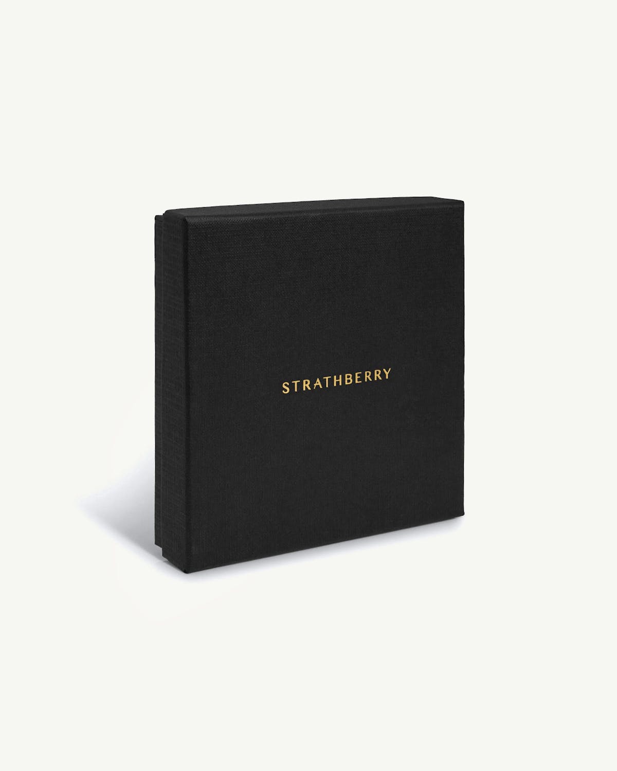 Black Strathberry box with gold logo, closed, on white background.