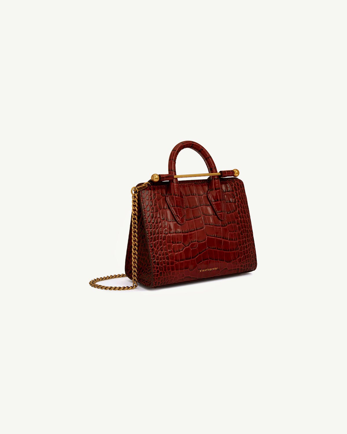 Strathberry nano tote croc leather with gold chain and bar hardware.