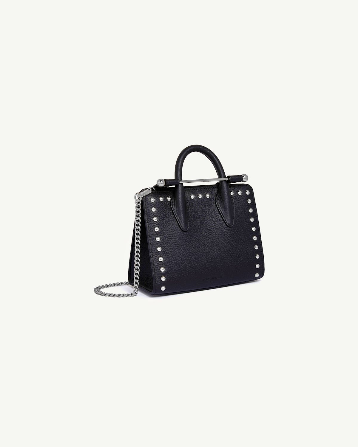 Black studded leather nano tote with top handle and silver chain strap.