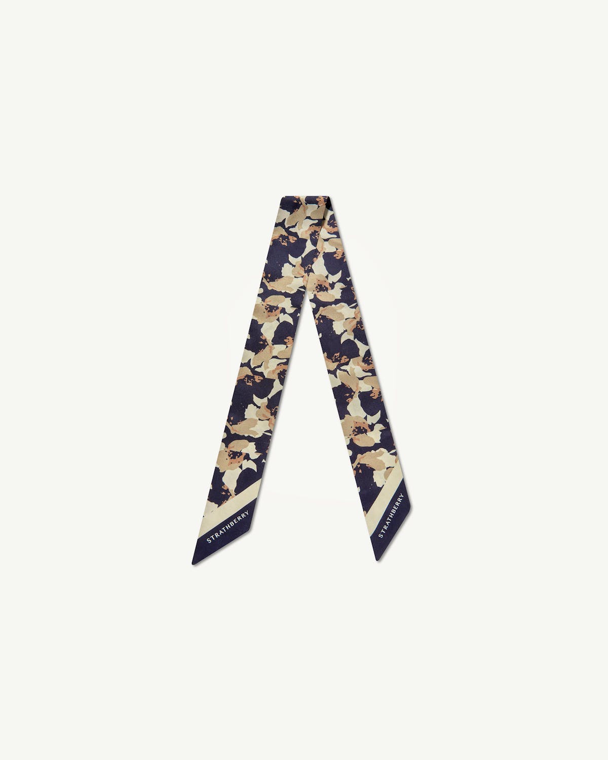 Navy and sand abstract floral silk skinny scarf with Strathberry logo on ends.
