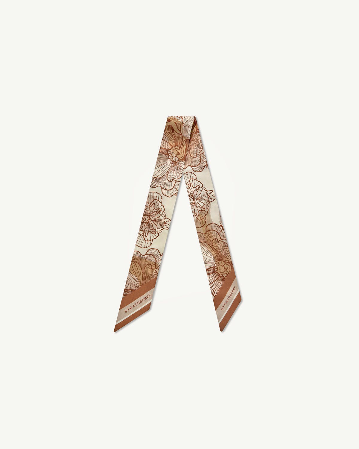 Floral chestnut and vanilla skinny silk scarf folded into a V shape, Strathberry logo visible.
