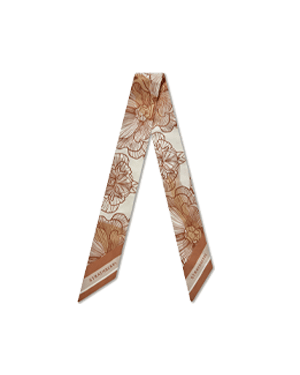 Floral chestnut and vanilla silk skinny scarf folded into a V shape