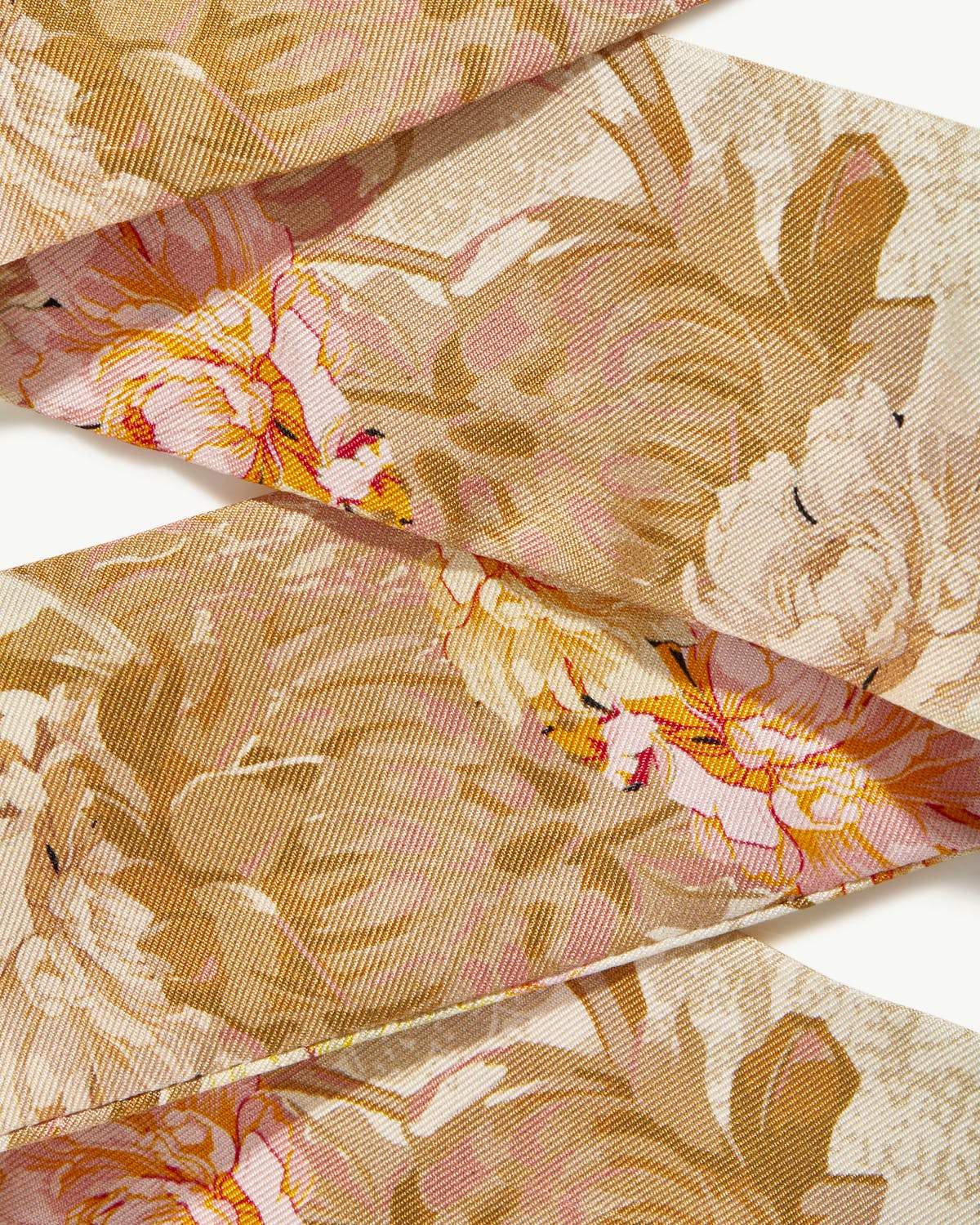 Folded silk skinny scarf with vanilla and pink floral print.