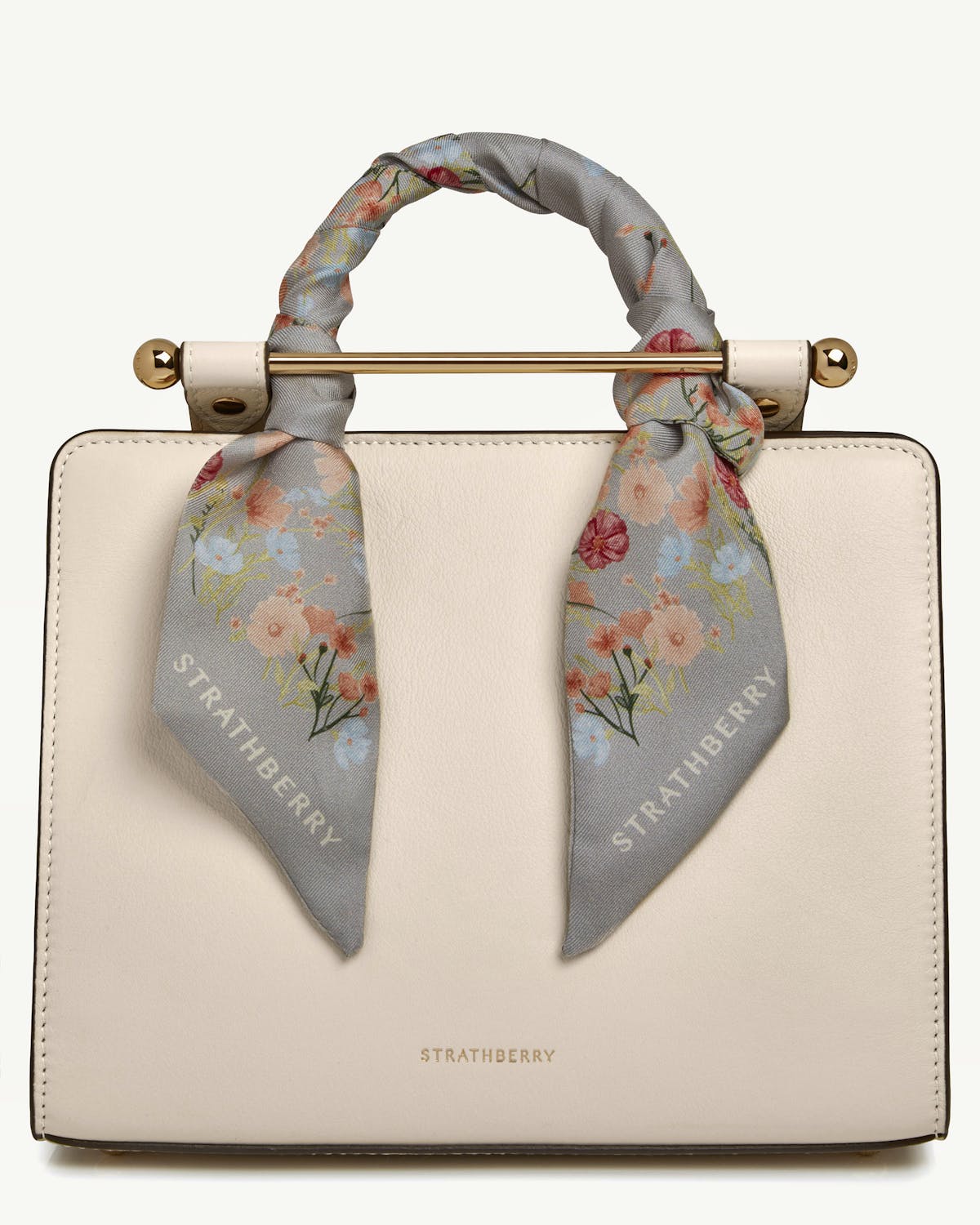 Marble grey floral silk skinny scarf tied to pale leather bag handle, Strathberry