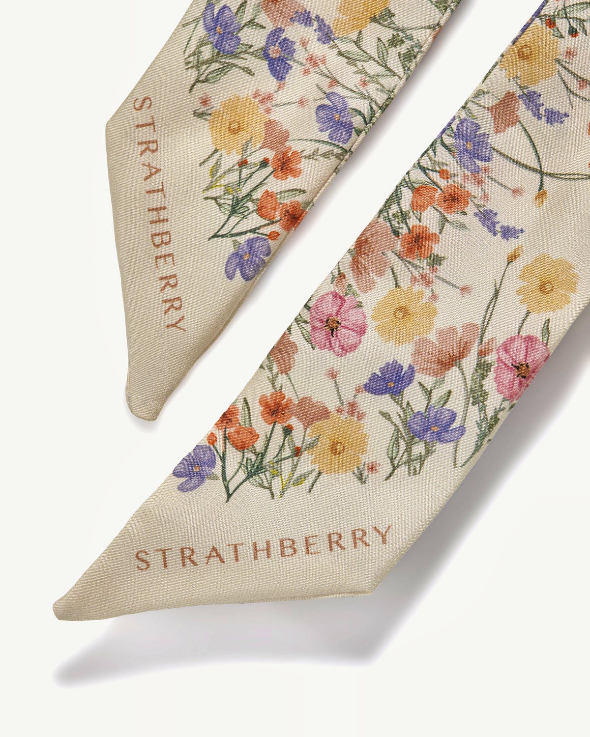 Vanilla silk skinny scarf with multicolour floral print and Strathberry logo.