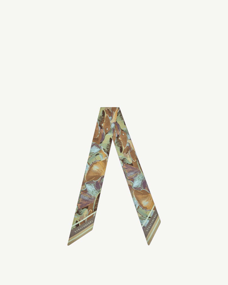 Silk skinny scarf in oat and mushroom print with Strathberry logo.