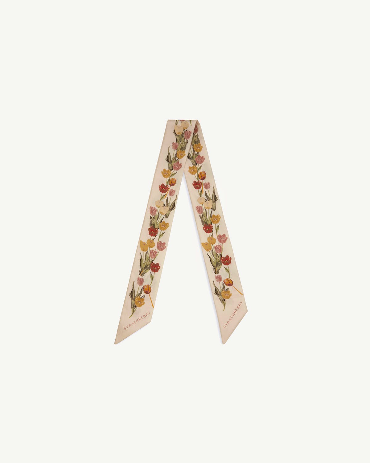 Vanilla silk skinny scarf with brûlée tulip print and Strathberry logo on both ends.