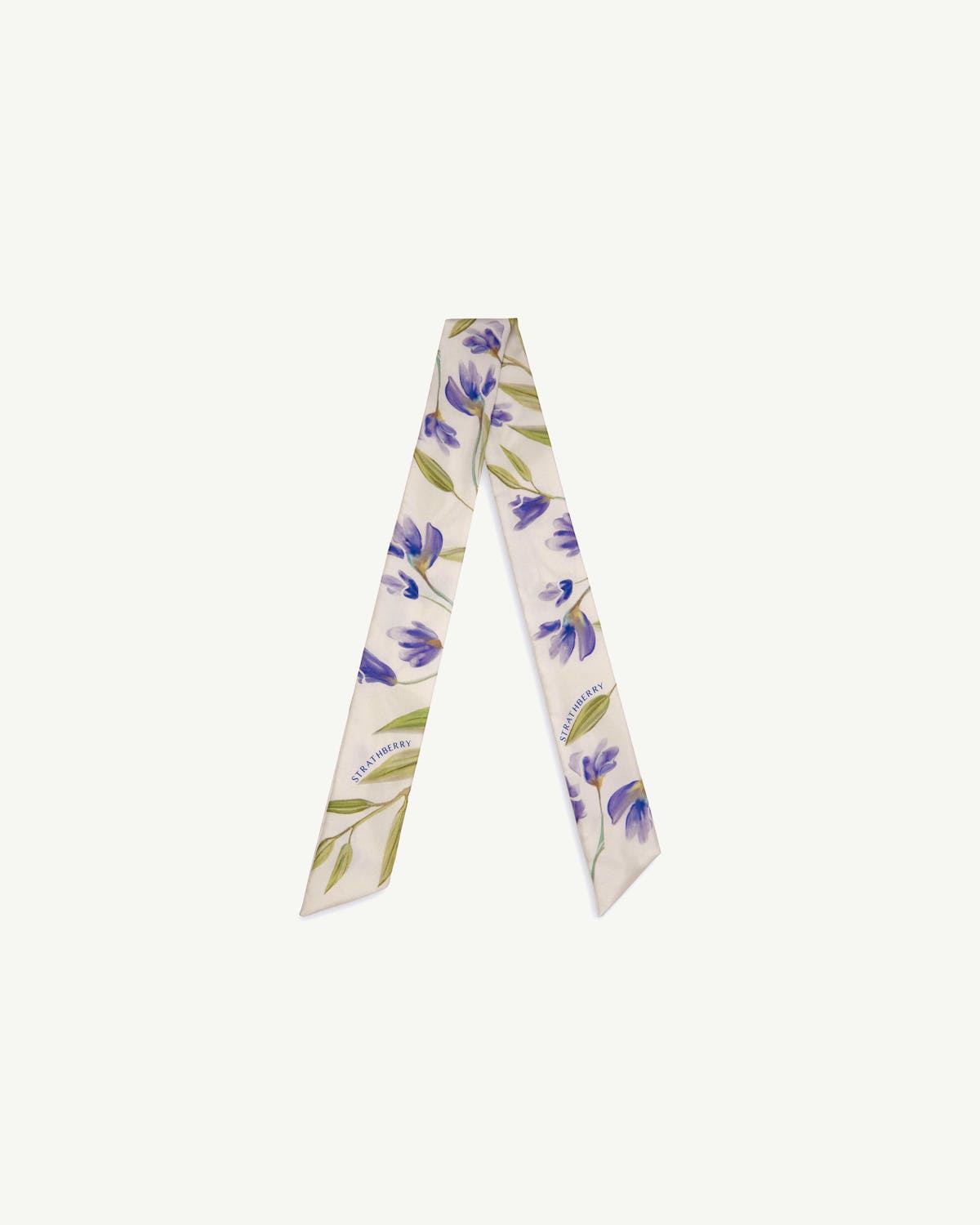 Vanilla silk skinny scarf with blue watercolour floral print and Strathberry logo.