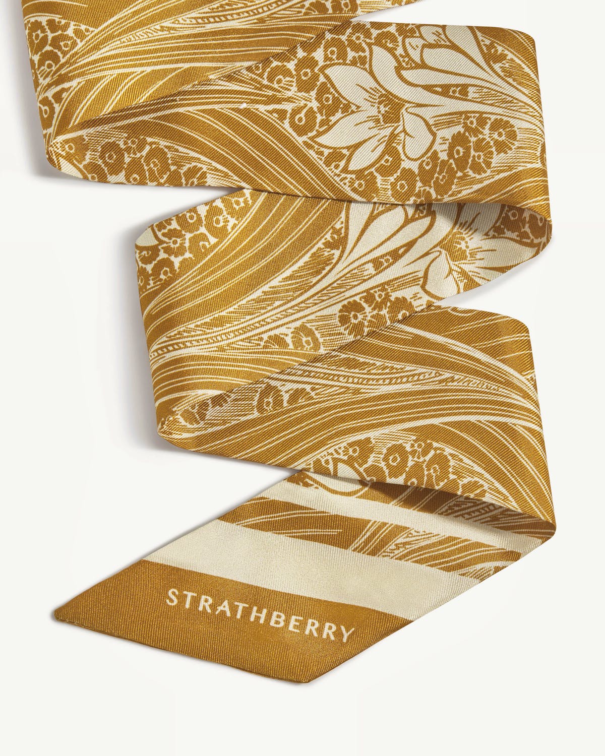 Mustard wallpaper print silk skinny scarf with Strathberry logo on white background.