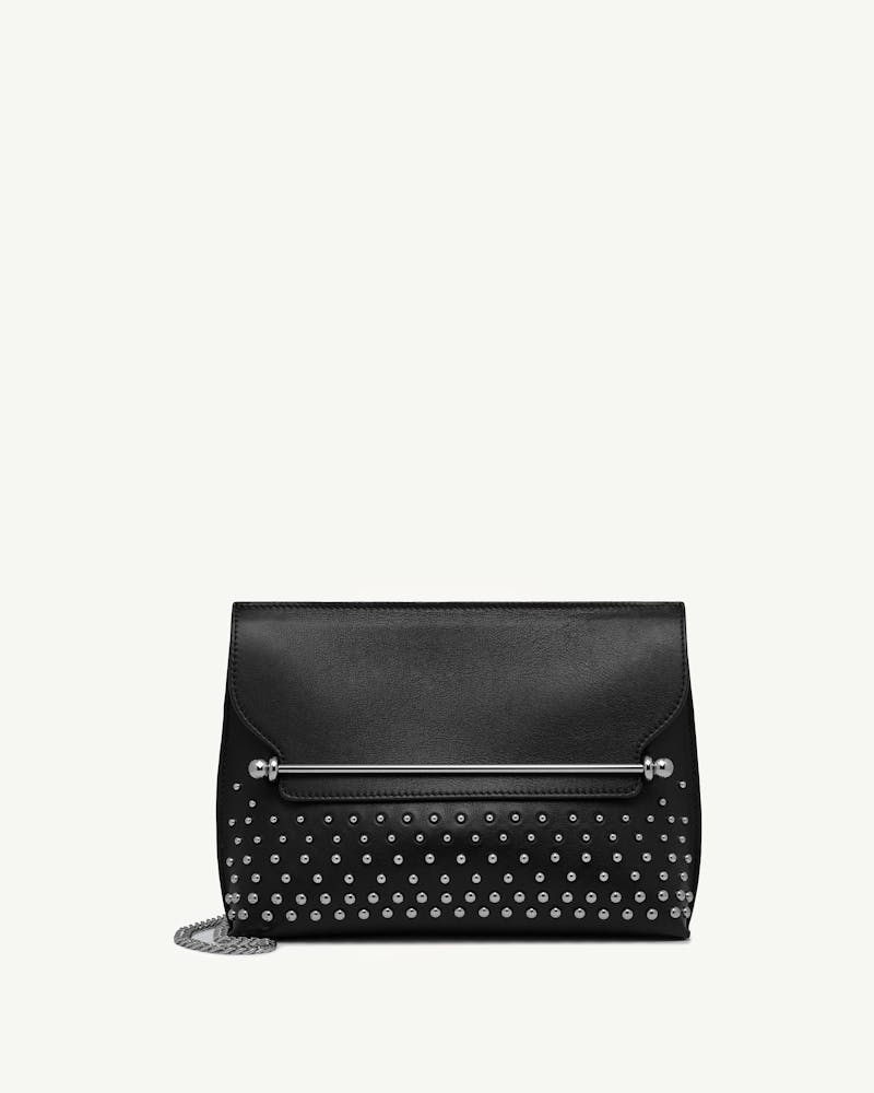 Black ombré studded leather stylist bag with silver bar and chain.