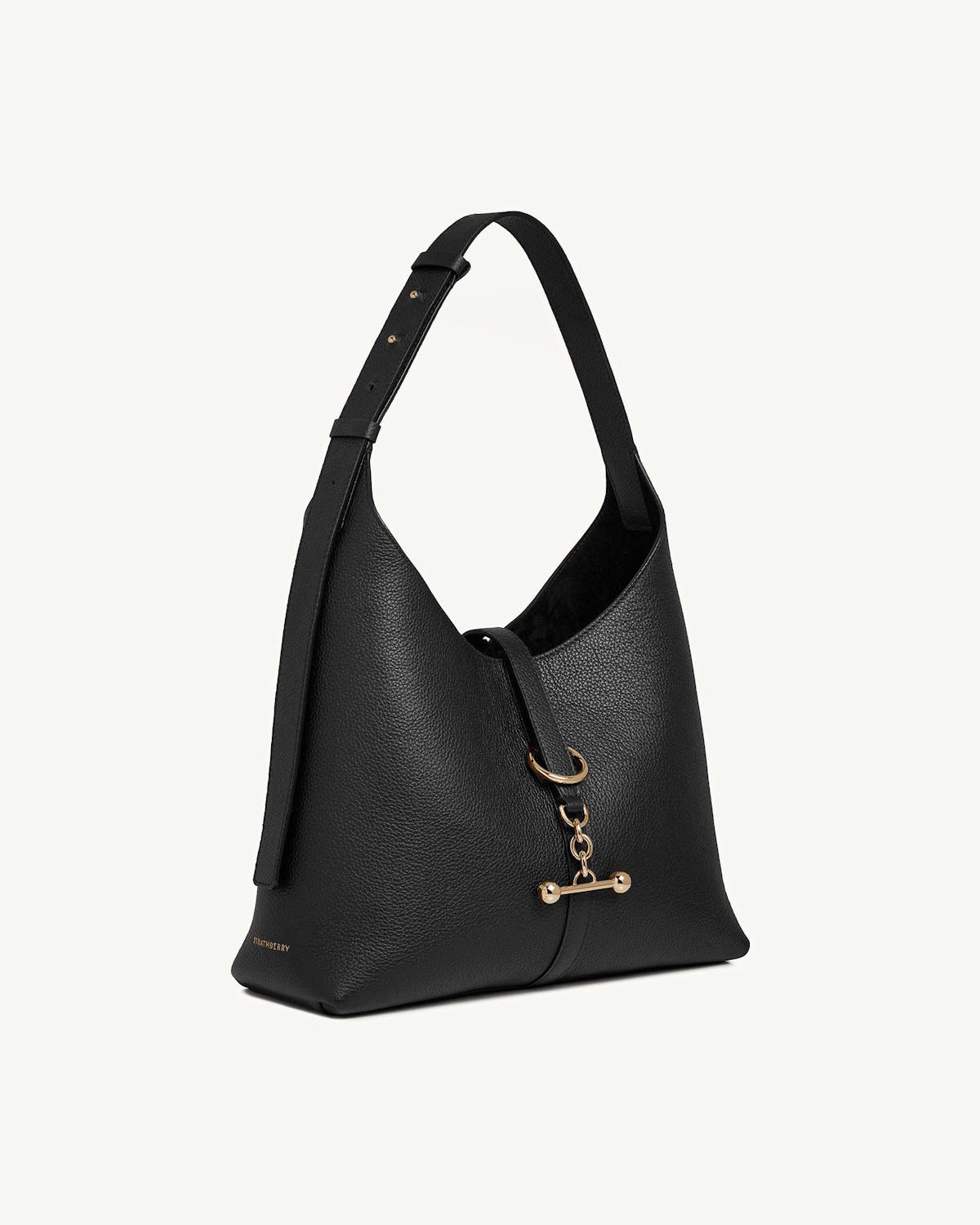 Strathberry black Kite Hobo leather bag with adjustable shoulder strap and gold bar fastener