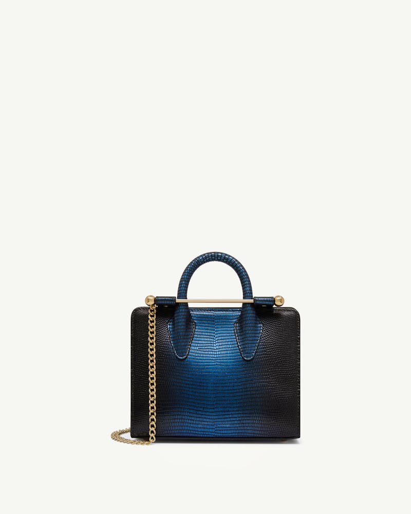 Nano tote in lizard texture with top handles, gold bar and chain strap.