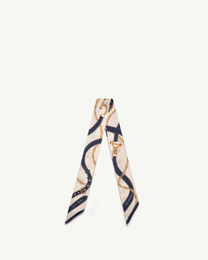 Navy and vanilla silk skinny scarf with belt and chain print, pointed ends.
