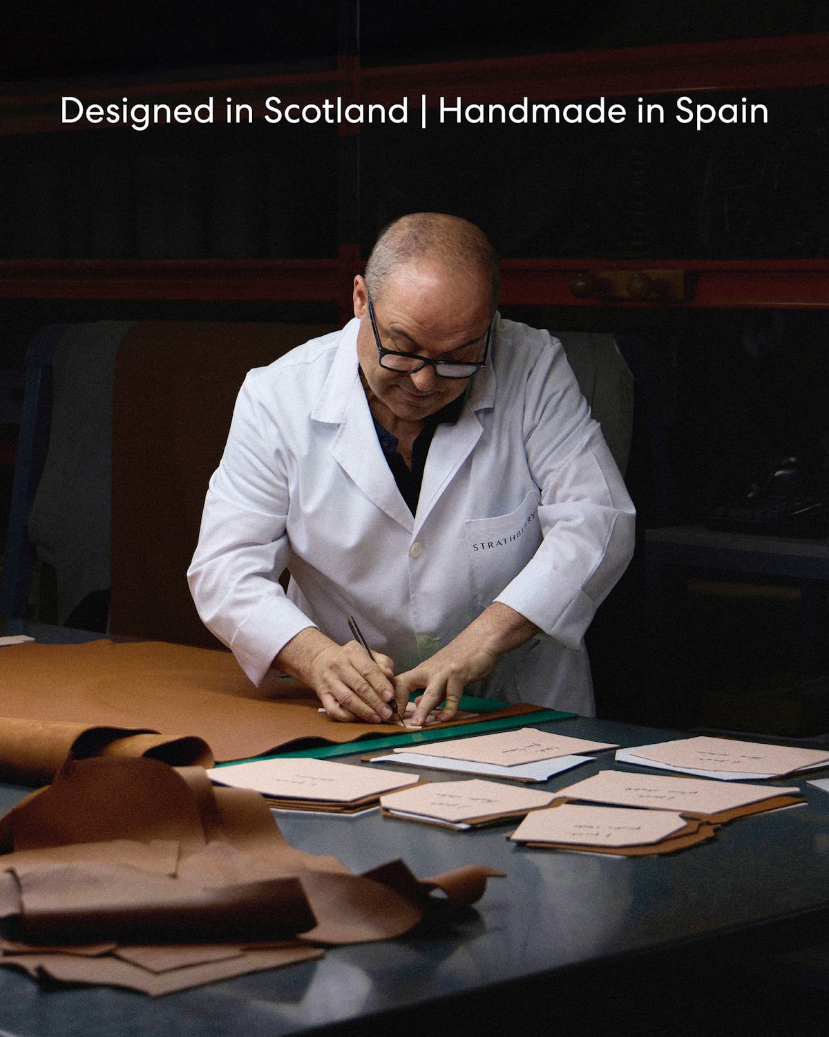 Craftsman marking tan leather panels for mosaic bag at Strathberry workshop