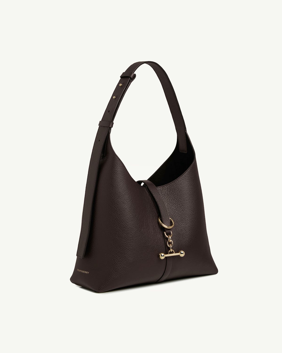 Strathberry Kite hobo bag in espresso leather with gold bar closure.