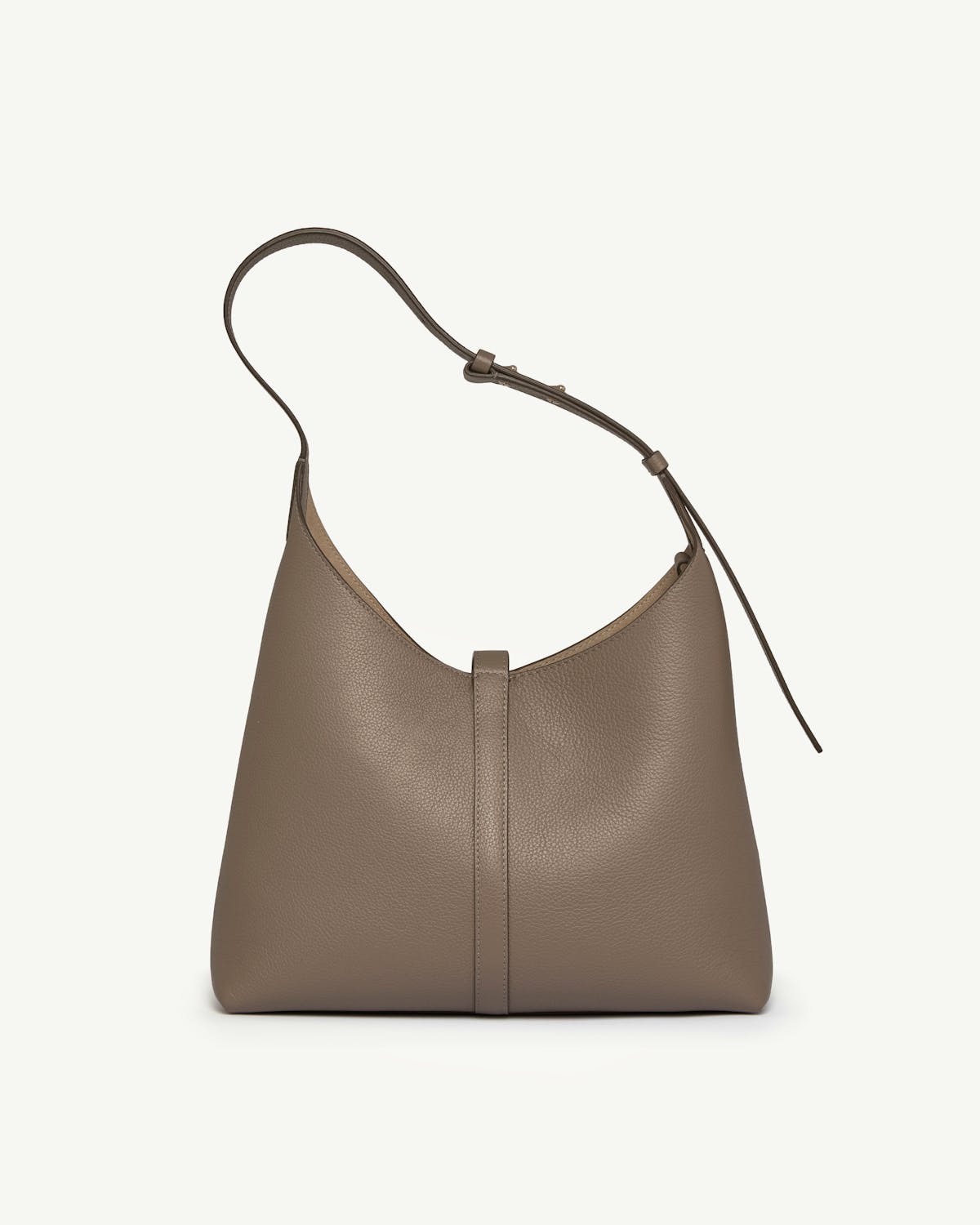 Taupe pebbled leather hobo bag with single adjustable shoulder strap and central seam.