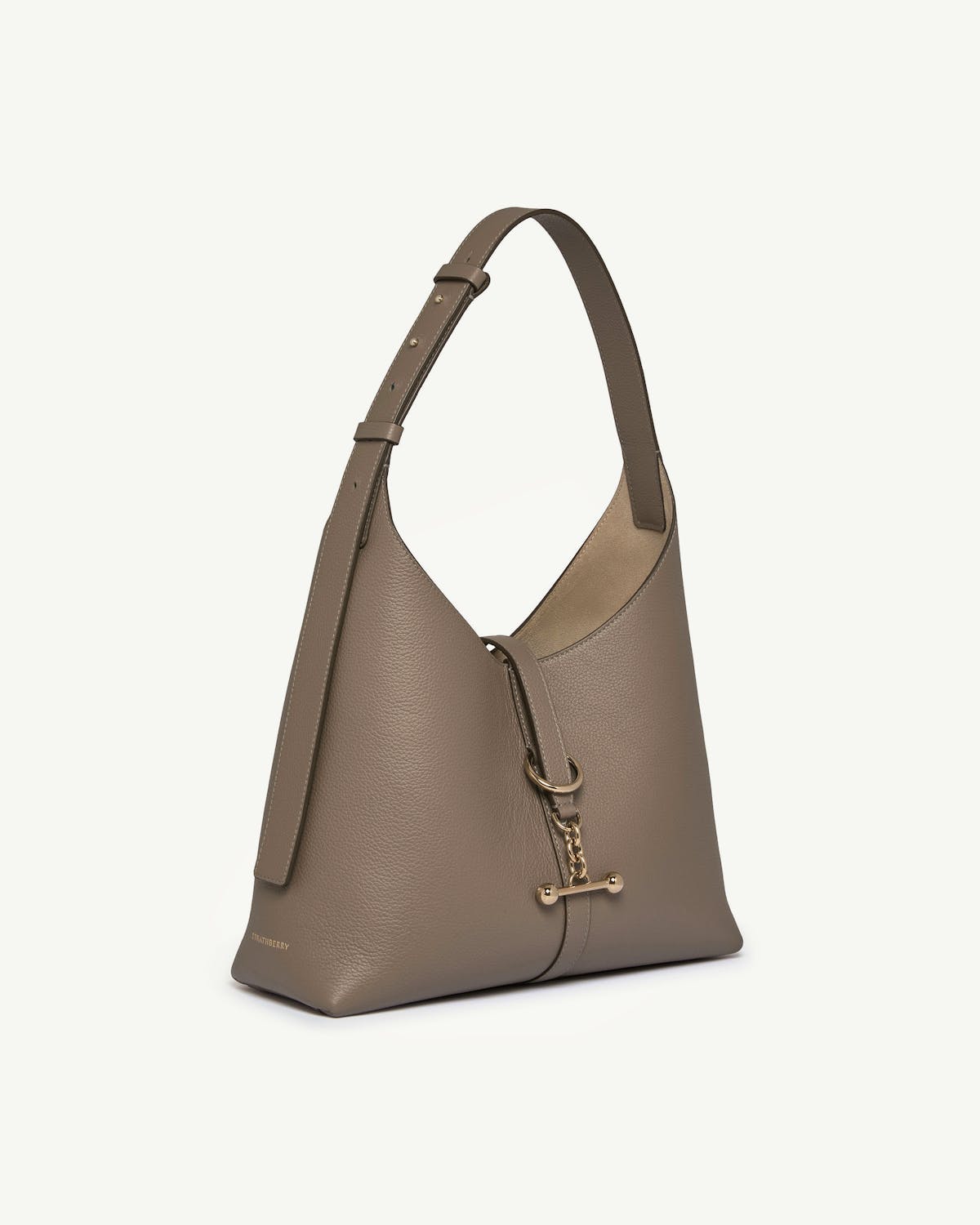 Taupe Strathberry Kite hobo bag with gold bar and chain detail.