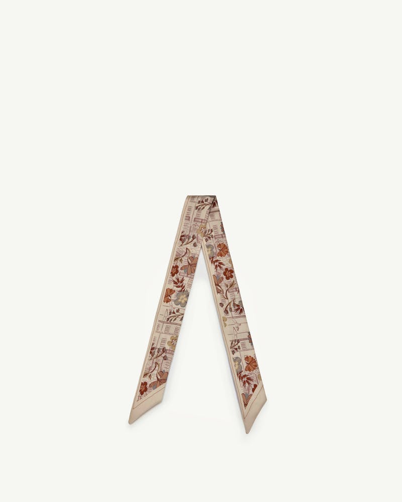 Silk skinny scarf with townhouse and floral print in beige and rust.