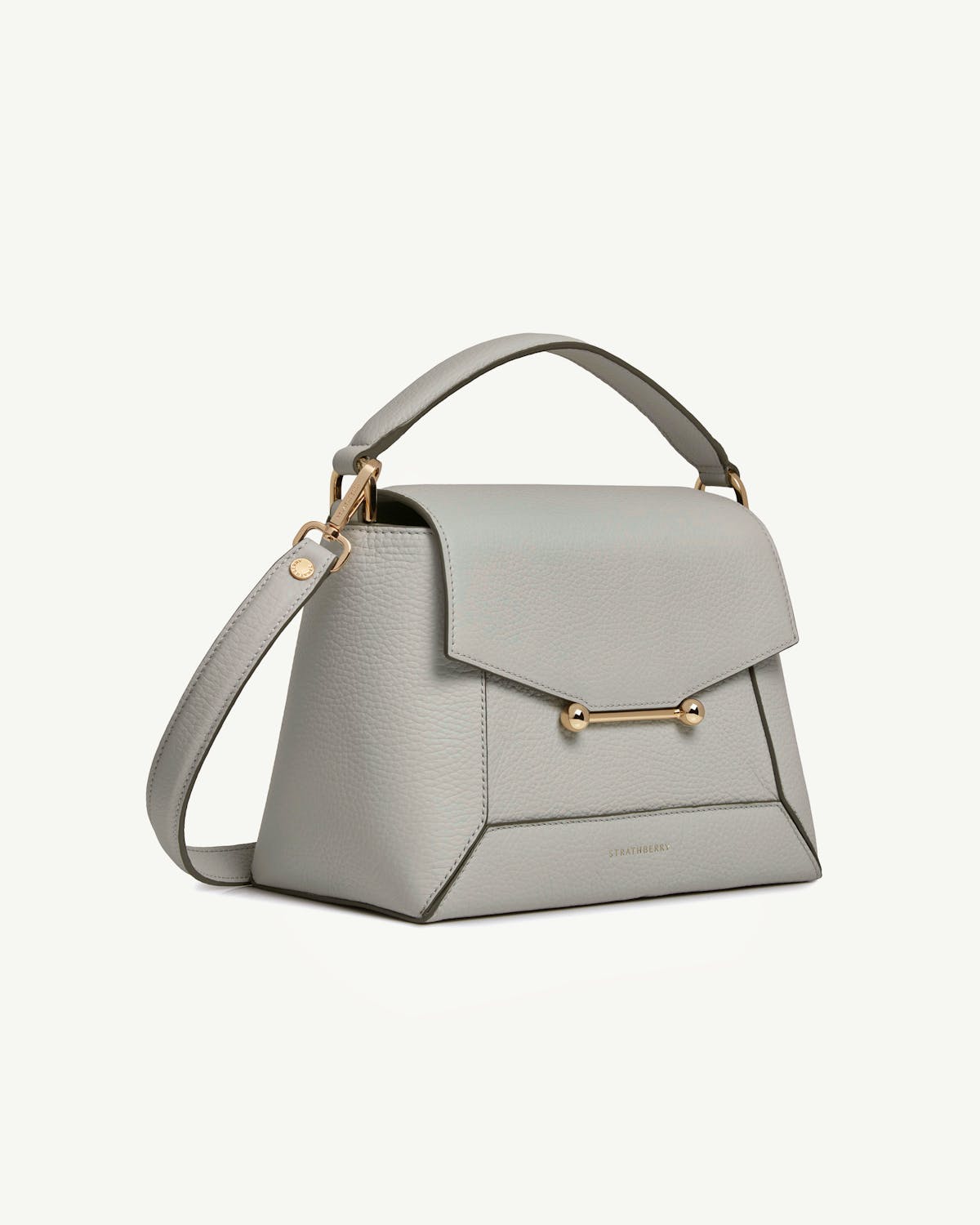 Strathberry mosaic bag in marble grey with top handle and gold hardware.