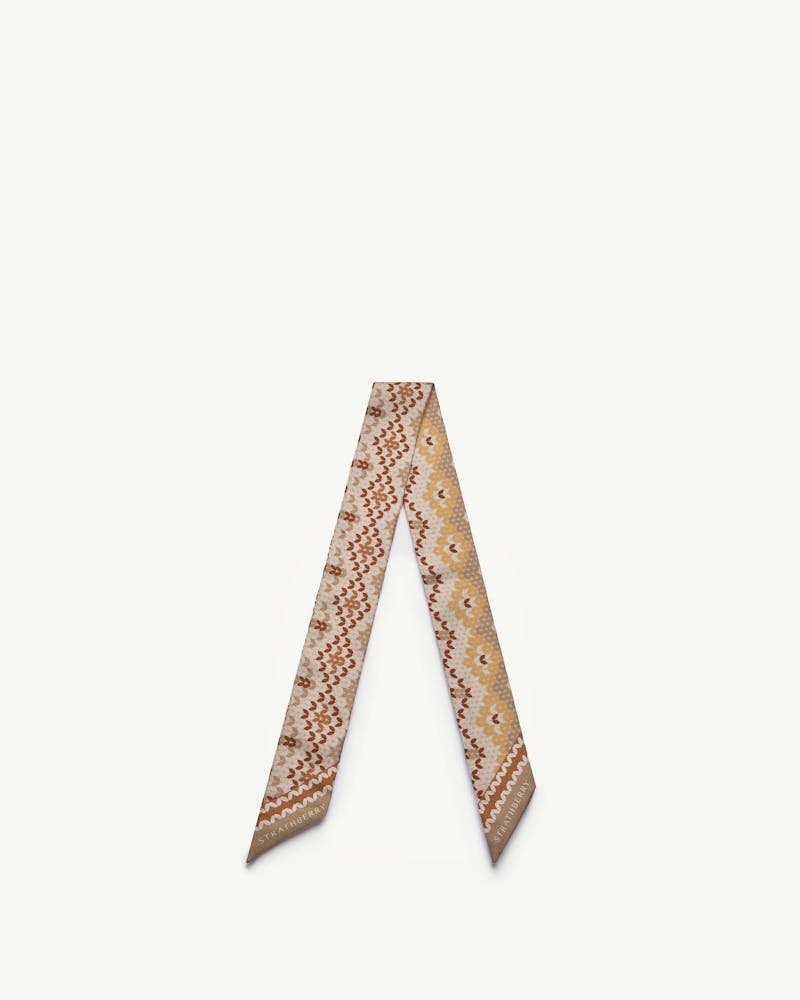 Brûlée Fair Isle silk skinny scarf with brown and beige pattern, Strathberry logo on tip.