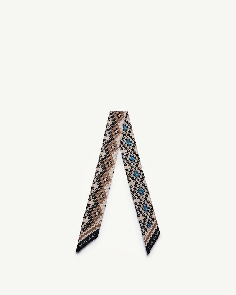 Strathberry silk skinny scarf in chestnut and blue Fair Isle pattern.