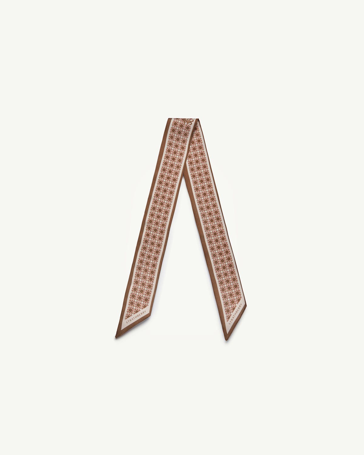 Tan silk skinny scarf with geometric print and Strathberry logo.