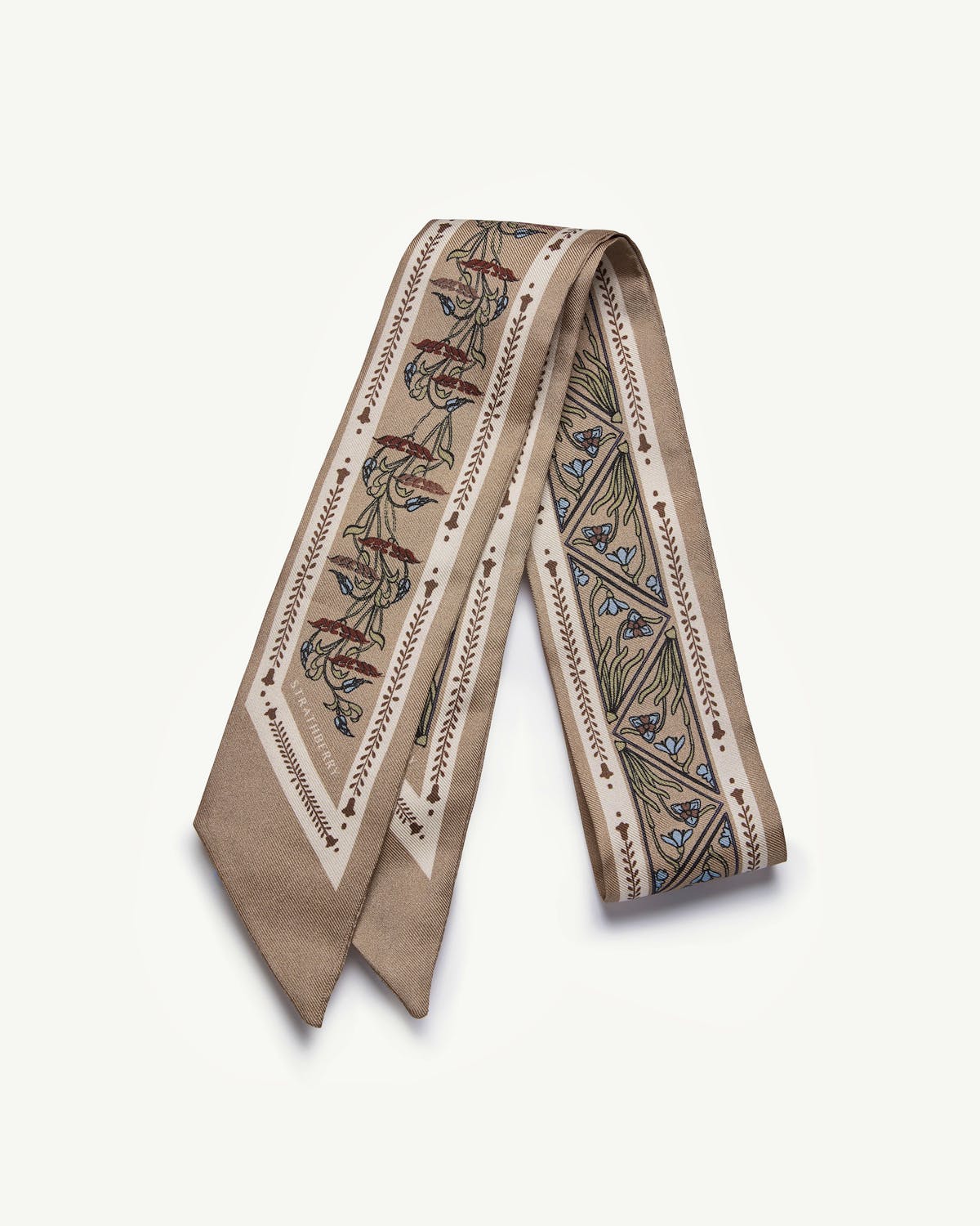 Caramel silk skinny scarf with geometric and floral print, folded