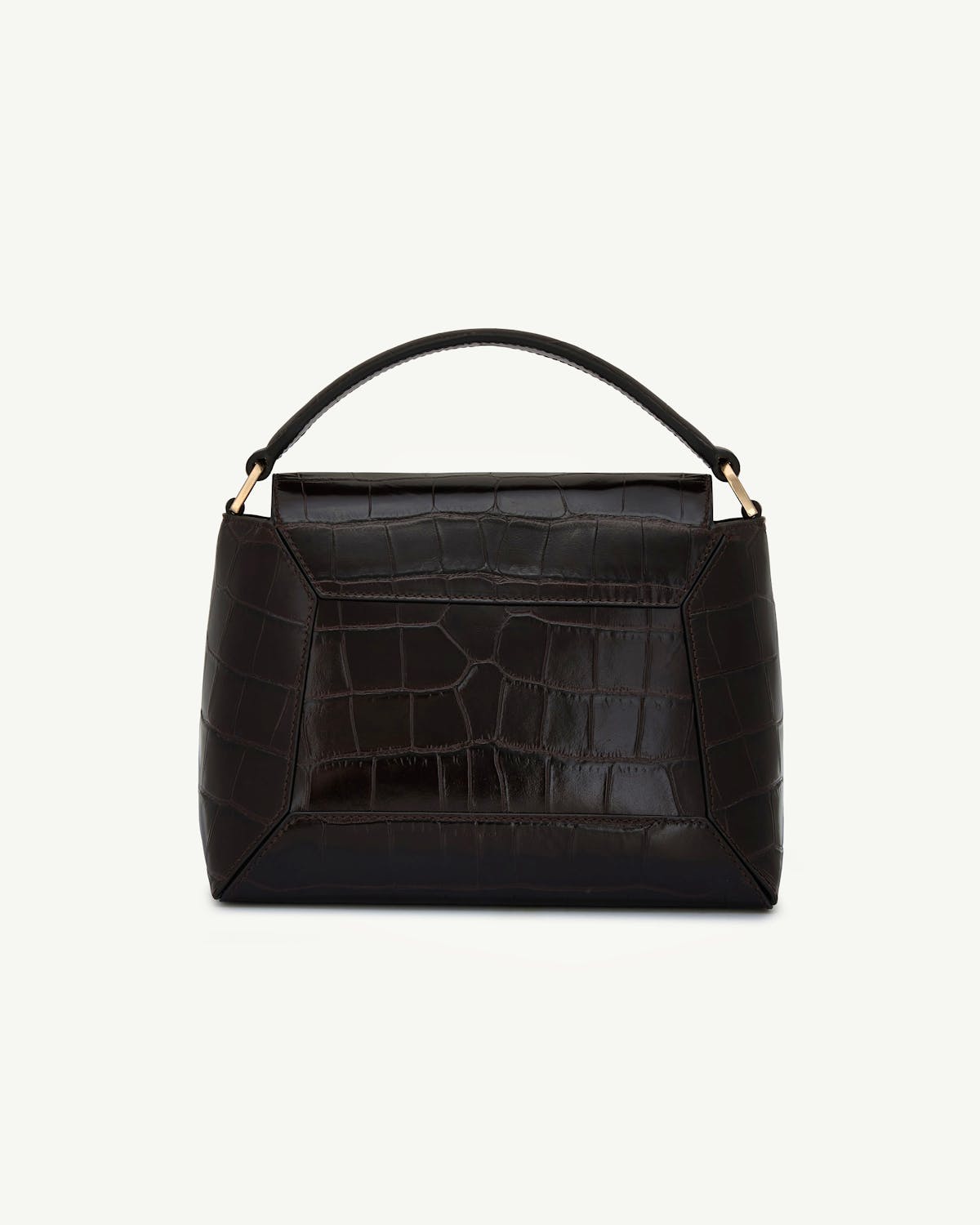 Dark croc-embossed mosaic structured top-handle bag with gold-tone hardware on white background.