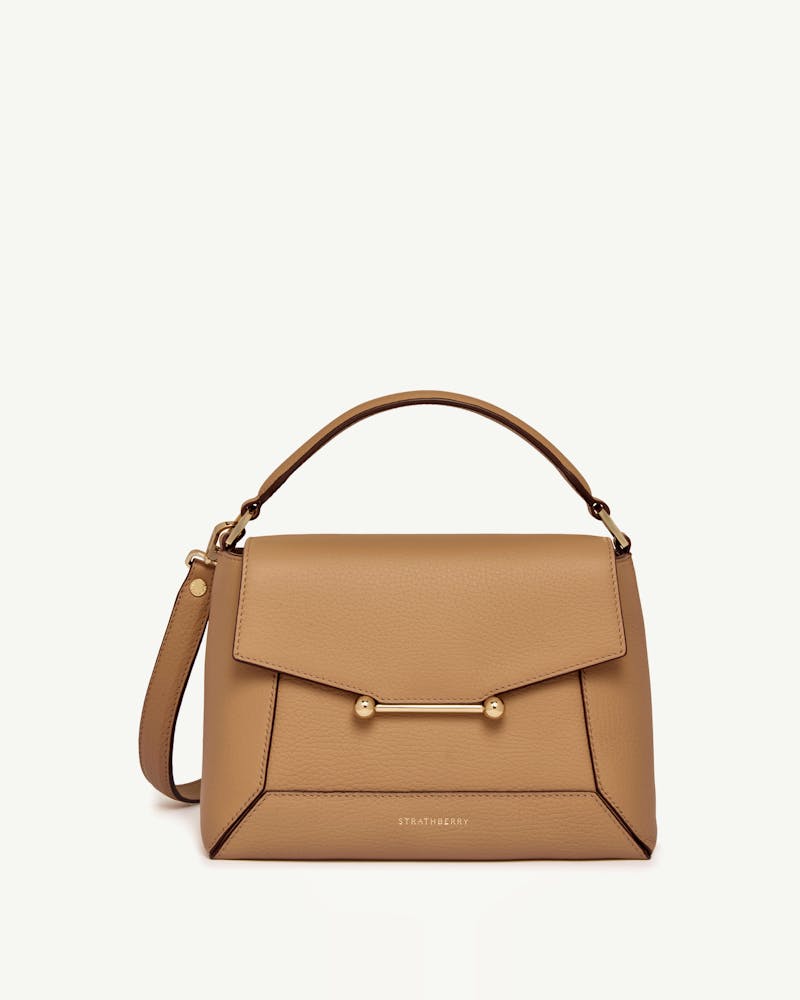 Caramel leather Strathberry mosaic bag with top handle and gold bar fastening.