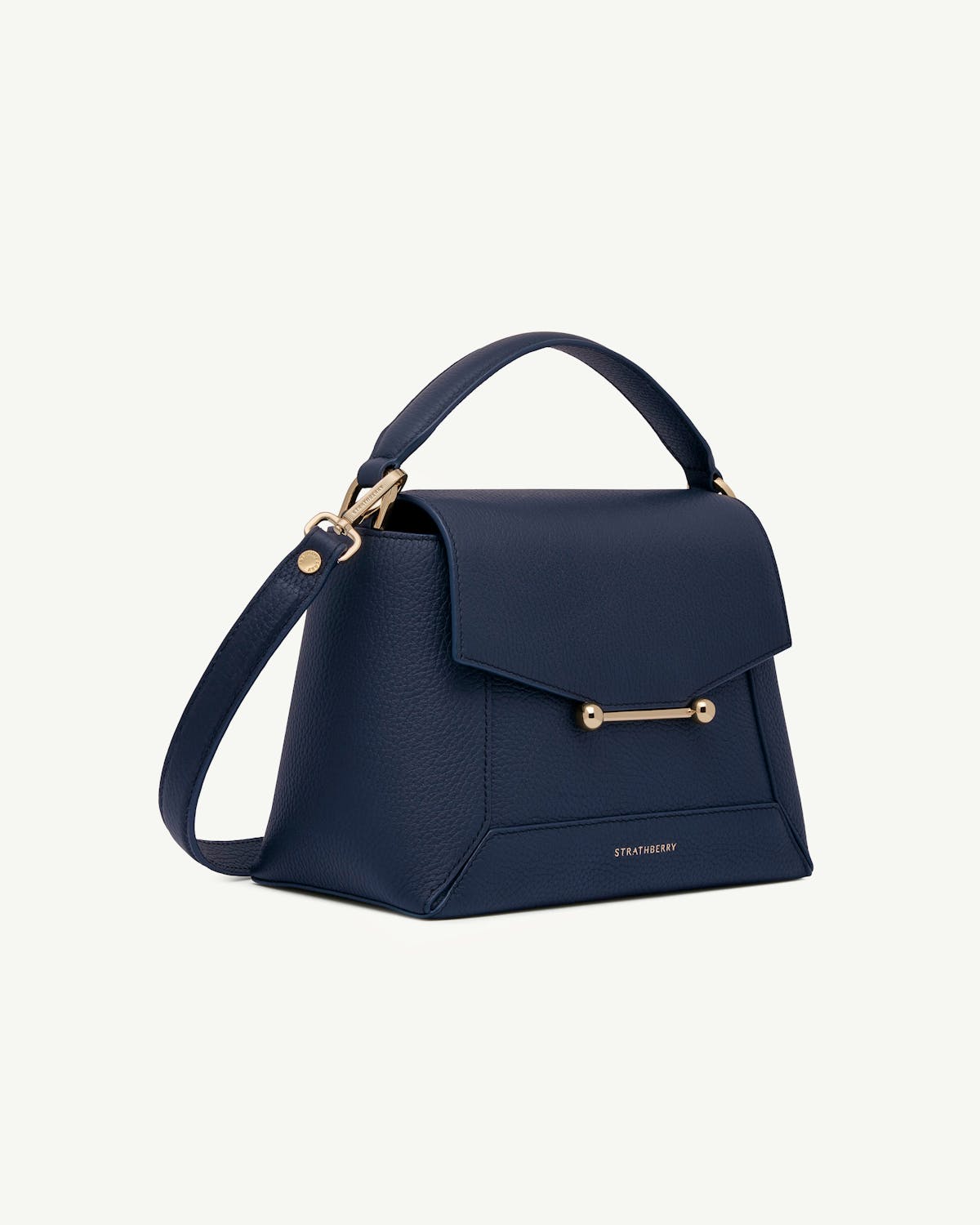 Navy mosaic bag with top handle, detachable shoulder strap and gold bar hardware, Strathberry.