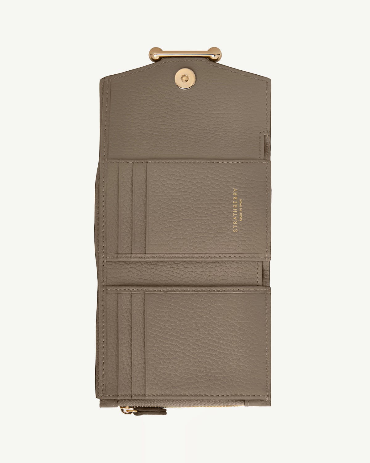 Taupe Strathberry trifold leather wallet, open showing card slots and gold clasp.