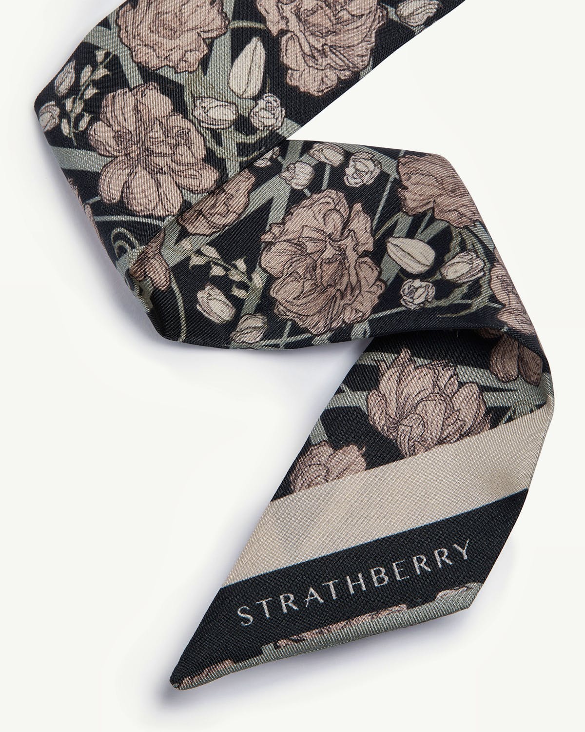 Silk skinny scarf with black and oat floral print and Strathberry logo on tip.