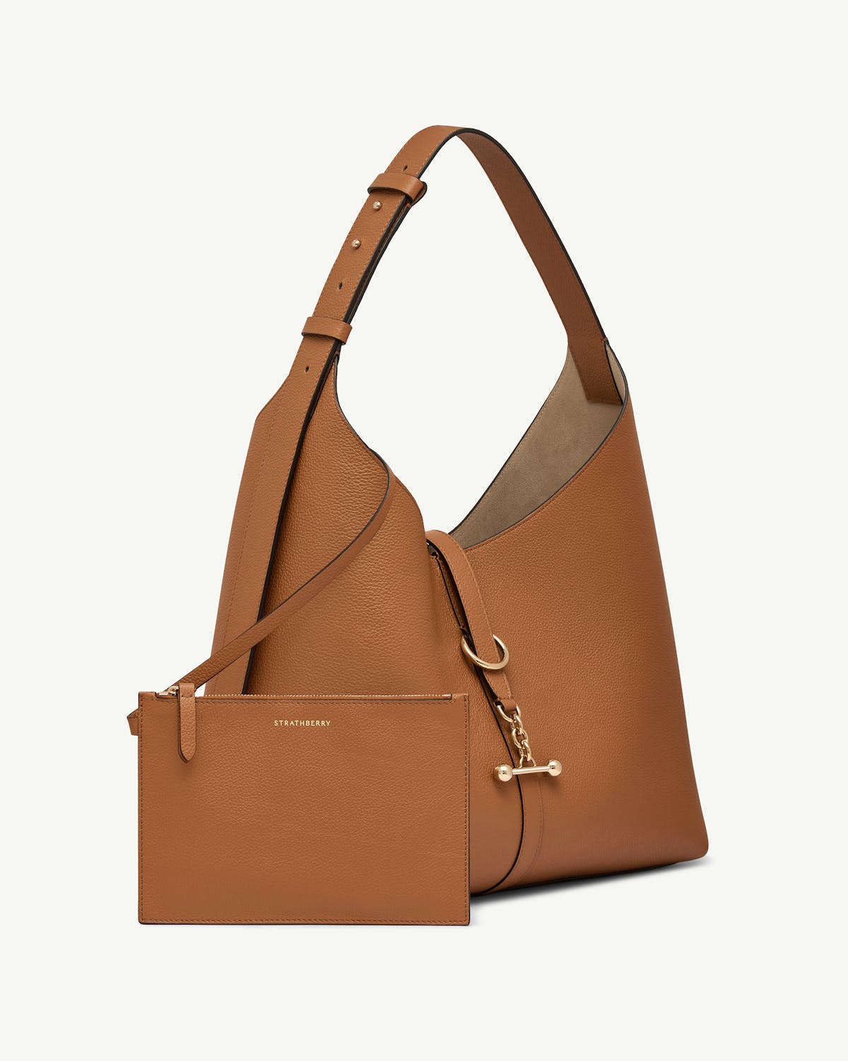 Tan Kite Hobo Maxi bag with detachable Strathberry pouch and gold fittings.