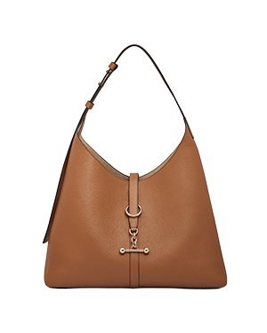 Tan leather kite-shaped hobo bag with single shoulder strap and bar clasp.