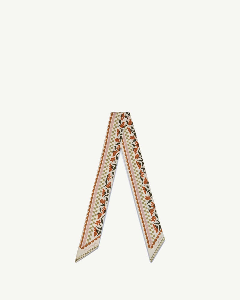 Strathberry vanilla silk skinny scarf with red gingham stripe and floral border.